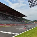 Nico Rosberg (GER) Mercedes AMG F1 W05 takes the chequered flag at the end of the session. Formula One World Championship, Rd12, Belgian Grand Prix, Qualifying, Spa-Francorchamps, Belgium, Saturday, 23 August 2014 © Sutton Images. No reproduction without permission