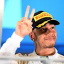 Race winner Lewis Hamilton (GBR) Mercedes AMG F1 celebrates on the podium. Formula One World Championship, Rd14, Singapore Grand Prix, Marina Bay Street Circuit, Singapore, Race Day, Sunday, 21 September 2014 © Sutton Images. No reproduction without permission