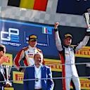 Race one podium (L to R): Second placed Arthur Pic (FRA) Campos Racing, race winner Stoffel Vandoorne (BEL) ART Grand Prix and third placed Mitch Evans (NZL) Russian Time celebrate on the podium. GP2 Series, Rd9, Monza, Italy, 6-7 September 2014. © Sutton Images. No reproduction without permission