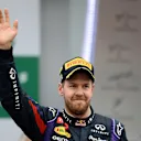 Race winner Sebastian Vettel (GER) Red Bull Racing on the podium. Formula One World Championship, Rd19, Brazilian Grand Prix, Race, Sao Paulo, Brazil, Sunday, 24 November 2013. © Sutton Images