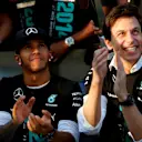 Race winner Lewis Hamilton (GBR) Mercedes AMG F1 and Toto Wolff (AUT) Mercedes AMG F1 Director of Motorsport celebrate. Formula One World Championship, Rd16, Russian Grand Prix, Race, Sochi Autodrom, Sochi, Krasnodar Krai, Russia, Sunday, 12 October 2014