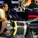 Renault Sport Engineer looks at the Red Bull Racing RB10. Formula One World Championship, Rd13, Italian Grand Prix, Monza, Italy, Practice, Friday, 5 September 2014