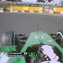 Caterham's Kamui Kobayashi is the first driver out on track in Q1, but locks up under braking for the hairpin on his first flying lap © FOWC Ltd