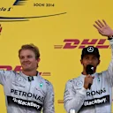 (L to R): Second placed Nico Rosberg (GER) Mercedes AMG F1 and winner Lewis Hamilton (GBR) Mercedes AMG F1 on the podium. Formula One World Championship, Rd16, Russian Grand Prix, Race, Sochi Autodrom, Sochi, Krasnodar Krai, Russia, Sunday, 12 October 2014