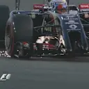 Sparks fly from the front wing of Romain Grosjean's Lotus. The Frenchman is eliminated in Q1. © FOWC Ltd. No reproduction without permission.