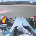 Mercedes' Lewis Hamilton locks up his front left tyre on his way to setting the early benchmark time in Q1 © FOWC Ltd. No reproduction without permission.