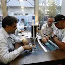 Judges discuss Tata Communications' inaugural F1 Connectivity Innovation Prize: (L to R) Mehul Kapadia, MD of the F1 Business, Tata Communications, Mercedes AMG Petronas team Executive Director (Technical), Paddy Lowe, and Mercedes driver Lewis Hamilton. © Tata Communications