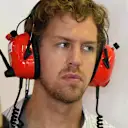 Sebastian Vettel (GER) Ferrari and Massimo Rivola (ITA) Ferrari Sporting Director. Formula One Testing, Yas Marina Circuit, Abu Dhabi, UAE, Tuesday, 25 November 2014. © Sutton Images