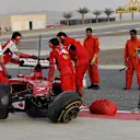 The crashed car of Kimi Raikkonen (FIN) Ferrari F14 T is recovered. Formula One Testing, Day Four, Bahrain International Circuit, Sakhir, Bahrain, Saturday, 22 February 2014 © Sutton Images. No reproduction without permission