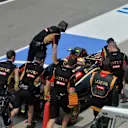 Pastor Maldonado (VEN) Lotus E22 is pushed along pit lane. Formula One World Championship, Rd2, Malaysian Grand Prix, Practice, Sepang, Malaysia, Friday, 28 March 2014. © Sutton Images