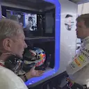 World Champion Sebastian Vettel has a watching brief in the Red Bull garage as he leaves the early running to his new team mate Daniel Ricciardo © FOWC Ltd. No reproduction without permission.