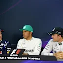 Press Conference and qualifying results: 1st Lewis Hamilton (GBR) Mercedes AMG F1, centre. 2nd Sebastian Vettel (GER) Red Bull Racing, left. 3rd Nico Rosberg (GER) Mercedes AMG F1, right. Formula One World Championship, Rd2, Malaysian Grand Prix, Qualifying, Sepang, Malaysia, Saturday, 29 March 2014. © Sutton Images