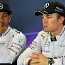 Pole sitter Lewis Hamilton (GBR) Mercedes AMG F1 and Nico Rosberg (GER) Mercedes AMG F1 in the Press Conference. Formula One World Championship, Rd1, Australian Grand Prix, Qualifying, Albert Park, Melbourne, Australia, Saturday, 15 March 2014. © Sutton Images