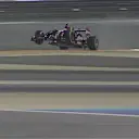  Pastor Maldonado runs wide at Turn 4 and launches over the kerb, sending shards flying off his Lotus. © FOWC Ltd