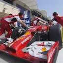 An embarrassing moment for Ferrari, as they release Fernando Alonso with different tyre compounds on the front of his car. The Spaniard stops in the pit lane and is pushed back to his garage. © FOWC Ltd