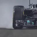  Lewis Hamilton locks a wheel at Turn 1, spoiling his final flying lap and handing pole to Mercedes team mate Nico Rosberg. © FOWC Ltd