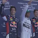 The top three drivers (L to R), Red Bull's Daniel Ricciardo, Mercedes pole man Lewis Hamilton and Red Bull's Sebastian Vettel acknowledge the fans after a thrilling qualifying session in Shanghai. © FOWC Ltd