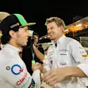 Sergio Perez (MEX) Force India celebrates with Nico Hulkenberg (GER) Force India F1. Formula One World Championship, Rd3, Bahrain Grand Prix, Race, Bahrain International Circuit, Sakhir, Bahrain, Sunday, 6 April 2014. © Sutton Images