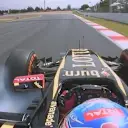 Romain Grosjean continues to struggle with his Lotus as he locks up his front left heading into Turn 10. © FOWC Ltd.