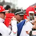 Kimi Raikkonen (FIN) Ferrari signs autographs for the fans. Formula One World Championship, Rd4, Chinese Grand Prix, Preparations, Shanghai, China, Thursday, 17 April 2014. © Sutton Images
