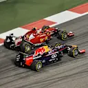 Sebastian Vettel (GER) Red Bull Racing RB10 and Kimi Raikkonen (FIN) Ferrari F14 T. Formula One World Championship, Rd3, Bahrain Grand Prix, Race, Bahrain International Circuit, Sakhir, Bahrain, Sunday, 6 April 2014. © Sutton Images