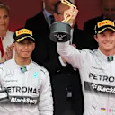 (L to R): Second placed Lewis Hamilton (GBR) Mercedes AMG F1 and race winner Nico Rosberg (GER) Mercedes AMG F1 on the podium. Formula One World Championship, Rd6, Monaco Grand Prix, Race, Monte-Carlo, Monaco, Sunday, 25 May 2014. © Sutton Images