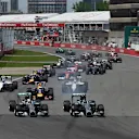 Nico Rosberg (GER) Mercedes AMG F1 W05 and Lewis Hamilton (GBR) Mercedes AMG F1 W05 at the start of the race. Formula One World Championship, Rd7, Canadian Grand Prix, Qualifying, Montreal, Canada, Sunday, 8 June 2014. © Sutton Images