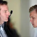 Mark Temple (GBR) McLaren Race Engineer and Kevin Magnussen (DEN) McLaren. Formula One World Championship, Rd8, Austrian Grand Prix, Practice, Spielberg, Austria, Friday, 20 June 2014. © Sutton Images