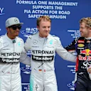 (L to R): Lewis Hamilton (GBR) Mercedes AMG F1, pole sitter Nico Rosberg (GER) Mercedes AMG F1 and Sebastian Vettel (GER) Red Bull Racing celebrate in parc ferme. Formula One World Championship, Rd7, Canadian Grand Prix, Qualifying, Montreal, Canada, Saturday, 7 June 2014. © Sutton Images