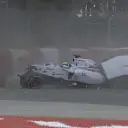 Felipe Massa's Williams hits the tyre wall at Turn 1 at high speed, bringing out the safety car for the final lap. © FOWC Ltd