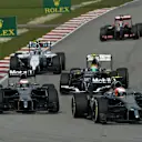 Kevin Magnussen (DEN) McLaren MP4-29 leads Jenson Button (GBR) McLaren MP4-29. Formula One World Championship, Rd2, Malaysian Grand Prix, Race, Sepang, Malaysia, Sunday, 30 March 2014. © Sutton Images