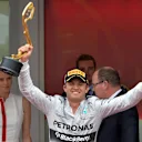 Race winner Nico Rosberg (GER) Mercedes AMG F1, centre, with HSH Prince Albert of Monaco (MON), right, and his wife SAS Princess Charlene (RSA), left, on the podium. Formula One World Championship, Rd6, Monaco Grand Prix, Race, Monte-Carlo, Monaco, Sunday, 25 May 2014