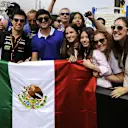 Sergio Perez (MEX) Force India F1 Team holds up a Mexican flag with fans. Formula One World Championship, Rd6, Monaco Grand Prix, Monte-Carlo, Monaco, Friday, 23 May 2014