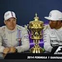 (L to R): Valtteri Bottas (FIN) Williams, race winner Lewis Hamilton (GBR) Mercedes AMG F1 in the Press Conference with the trophy. Formula One World Championship, Rd9, British Grand Prix, Race Day, Silverstone, England, Sunday, 6 July 2014