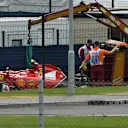 The crashed car of Kimi Raikkonen (FIN) Ferrari is recovered. Formula One World Championship, Rd9, British Grand Prix, Race Day, Silverstone, England, Sunday, 6 July 2014