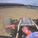 Romain Grosjean takes his Lotus through the gravel at Luffield. His comments over team radio suggest that he is struggling to control the car. © FOWC Ltd
