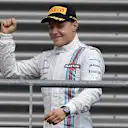 Valtteri Bottas (FIN) Williams celebrates on the podium. Formula One World Championship, Rd12, Belgian Grand Prix, Race Day, Spa-Francorchamps, Belgium, Sunday, 24 August 2014. © Sutton Images
