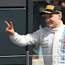 Second placed Valtteri Bottas (FIN) Williams Martini Racing on the podium. Formula One World Championship, Rd9, British Grand Prix, Race Day, Silverstone, England, Sunday, 6 July 2014. © Sutton Images
