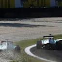 Adrian Sutil (GER) Force India F1 VJM03 runs wide at Parabolica after battling with team mate Vitantonio Liuzzi (ITA) Force India F1 VJM03. Formula One World Championship, Rd 14, Italian Grand Prix, Race, Monza, Italy, Sunday, 12 September 2010. © Sutton Images