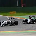 Jenson Button (GBR) McLaren MP4-29 and Kevin Magnussen (DEN) McLaren MP4-29 battle. Formula One World Championship, Rd12, Belgian Grand Prix, Race Day, Spa-Francorchamps, Belgium, Sunday, 24 August 2014. © Sutton Images