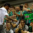 Race winner Lewis Hamilton (GBR) Mercedes AMG F1 celebrates with the team. Formula One World Championship, Rd14, Singapore Grand Prix, Marina Bay Street Circuit, Singapore, Race Day, Sunday, 21 September 2014
