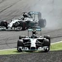 Nico Rosberg (GER) Mercedes AMG F1 W05 goes straight on at the first chicane and Lewis Hamilton (GBR) Mercedes AMG F1 W05 takes the lead. Formula One World Championship, Rd13, Italian Grand Prix, Monza, Italy, Race Day, Sunday, 7 September 2014