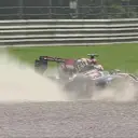 Another off-track moment for the unruly Lotus E22, as Romain Grosjean skips across the gravel at the first Lesmo. © FOWC Ltd