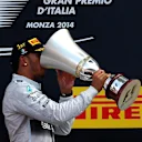 Race winner Lewis Hamilton (GBR) Mercedes AMG F1 with his trophy on the podium. Formula One World Championship, Rd13, Italian Grand Prix, Monza, Italy, Race Day, Sunday, 7 September 2014