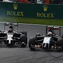 Jenson Button (GBR) McLaren MP4-29 and Sergio Perez (MEX) Force India VJM07 battle. Formula One World Championship, Rd13, Italian Grand Prix, Monza, Italy, Race Day, Sunday, 7 September 2014
