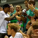 Race winner Lewis Hamilton (GBR) Mercedes AMG F1 celebrates with the team. Formula One World Championship, Rd14, Singapore Grand Prix, Marina Bay Street Circuit, Singapore, Race Day, Sunday, 21 September 2014