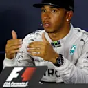 Lewis Hamilton (GBR) Mercedes AMG F1 in the post-qualifying Press Conference. Formula One World Championship, Rd14, Singapore Grand Prix, Marina Bay Street Circuit, Singapore, Qualifying, Saturday, 20 September 2014