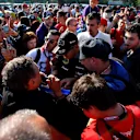 Pastor Maldonado (VEN) Lotus arrives at the track and signs autographs for the fans. Formula One World Championship, Rd13, Italian Grand Prix, Monza, Italy, Qualifying, Saturday, 6 September 2014