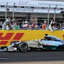 Race winner Lewis Hamilton (GBR) Mercedes AMG F1 W05 crosses the line. Formula One World Championship, Rd16, Russian Grand Prix, Race, Sochi Autodrom, Sochi, Krasnodar Krai, Russia, Sunday, 12 October 2014
