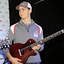 Esteban Gutierrez (MEX) Sauber with his personalised Gibson Les Paul guitar at the Austin Fans Forum in association with the Grand Prix Investors Fund that was held in the iconic Gibson Guitars showroom. Formula One World Championship, Rd17, United States Grand Prix, Preparations, Austin, Texas, USA, Wednesday, 29 October 2014